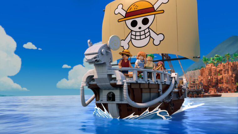 Luffy, Nami, Zoro e Usopp em versões LEGO a bordo do Going Merry, com a bandeira dos Chapéus de Palha
